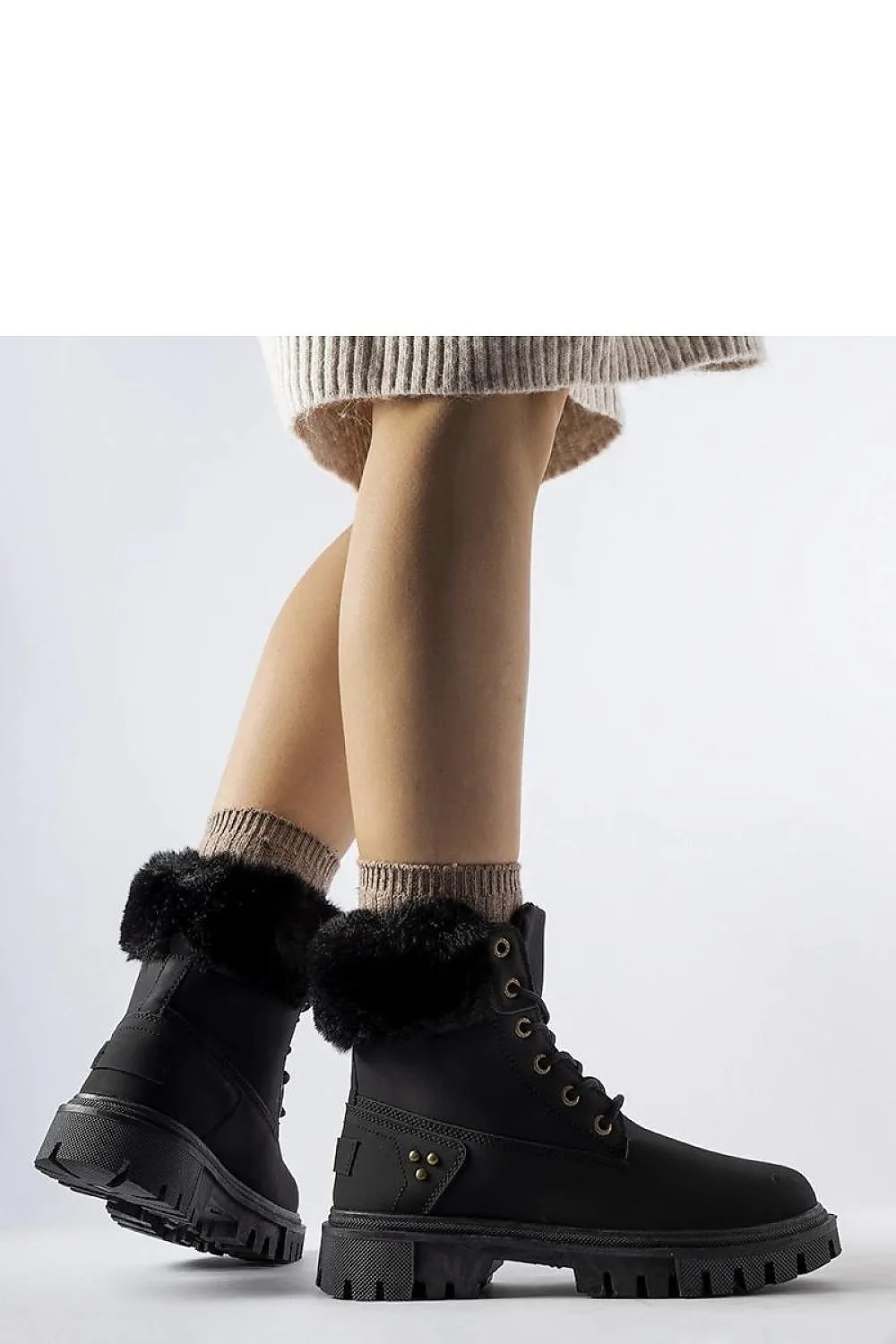 High-top boots with decorative fur
