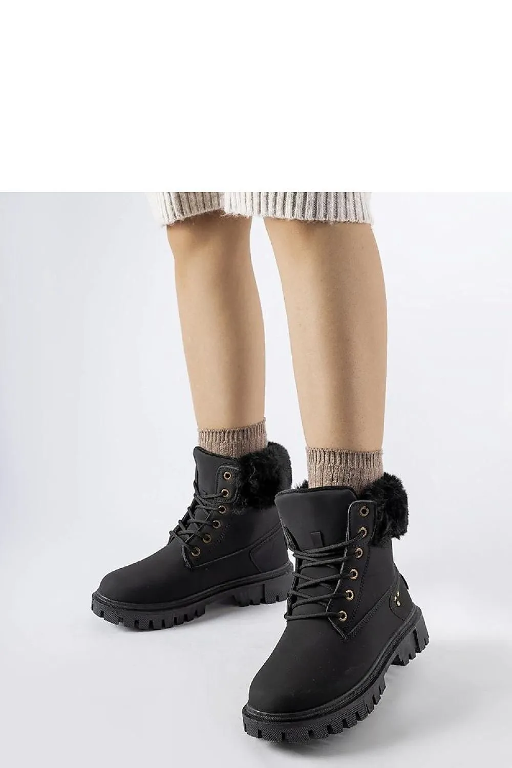 High-top boots with decorative fur