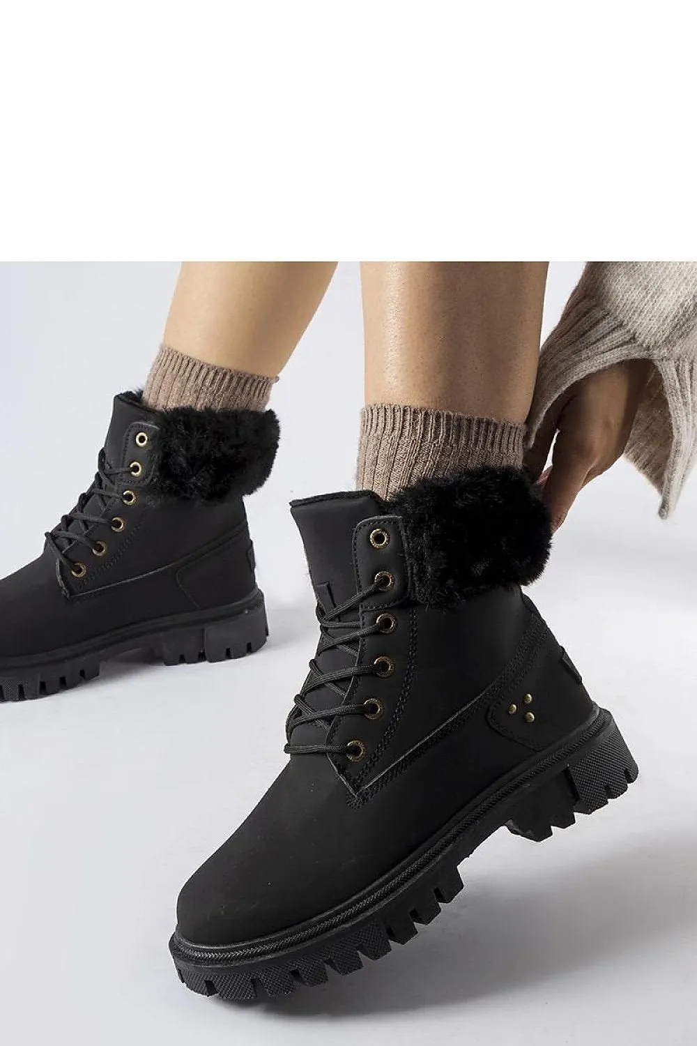 High-top boots with decorative fur